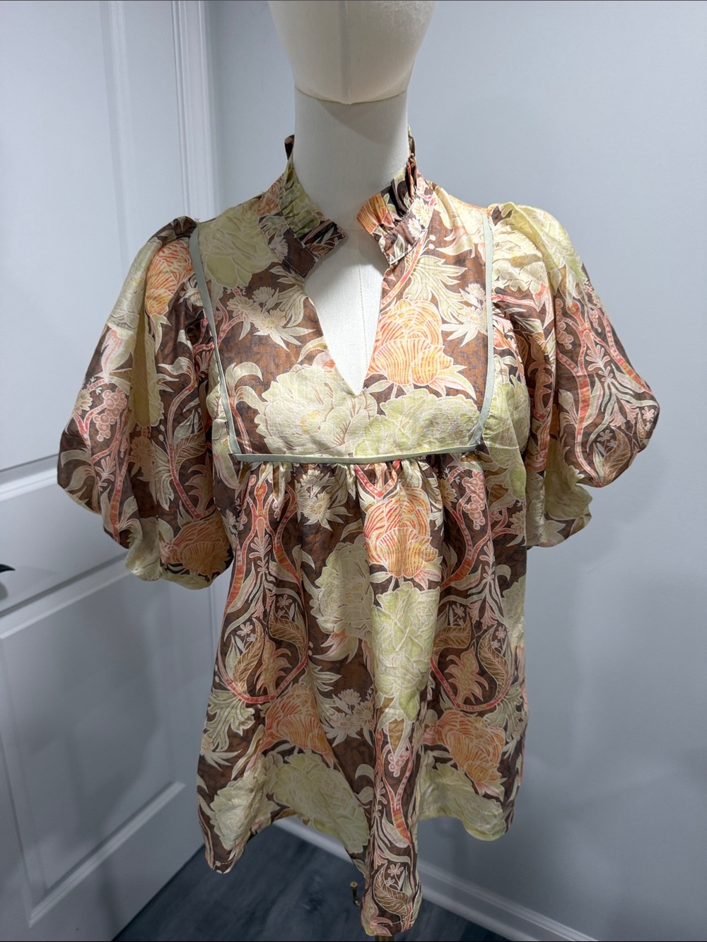 Umgee Floral Ruffle-Neck Puff Sleeve Blouse in Brown, Cream, and Peach